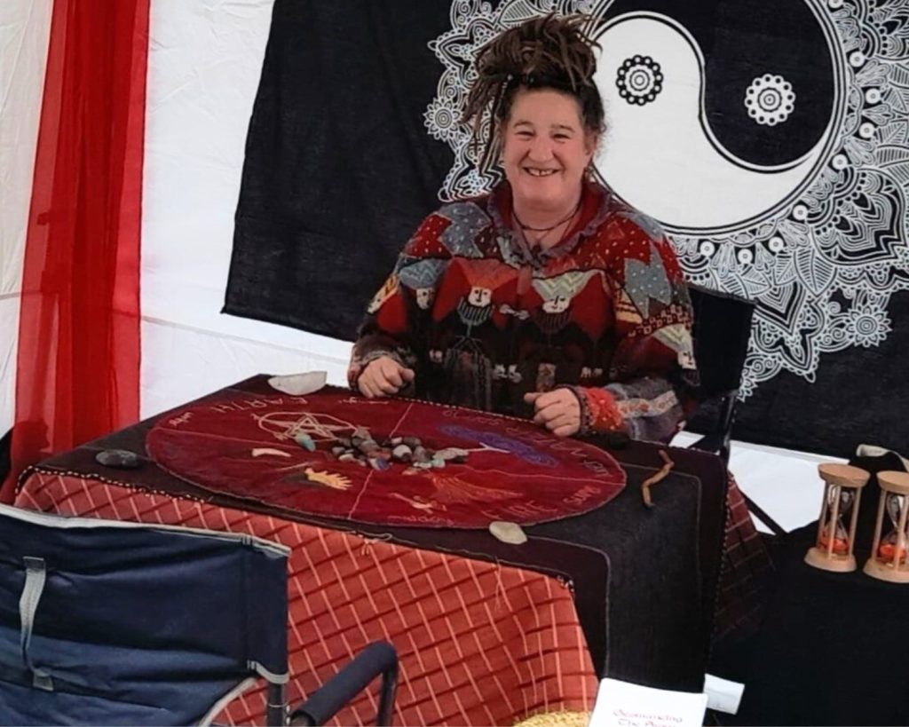 Lisa is ready for geomancy readings in her marquee